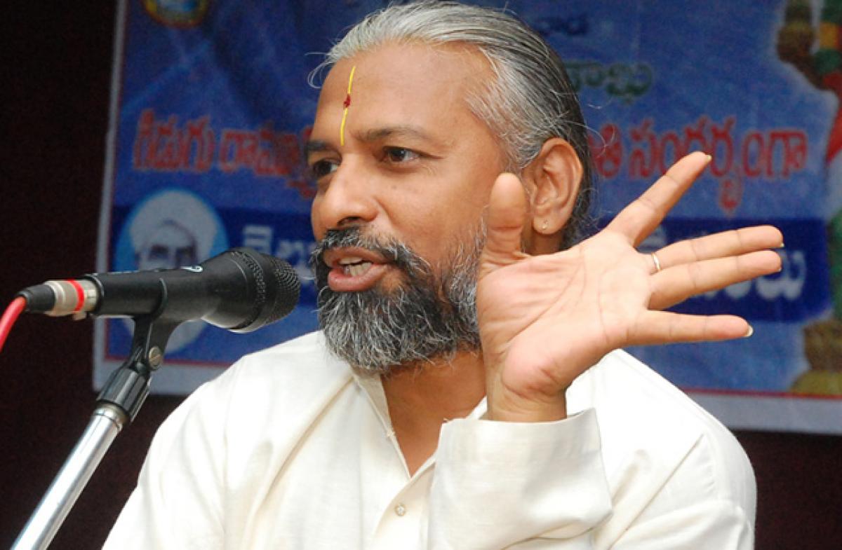 Renowned scholar Vedantam Rajagopala Chakravarthy speaking at the Telugu Language Day celebrations, at Maris Stella College